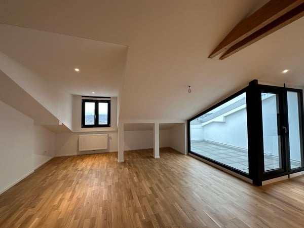 Moderne 2.5-Zimmerdachwohnung im 3. Stock mit Balkon 3