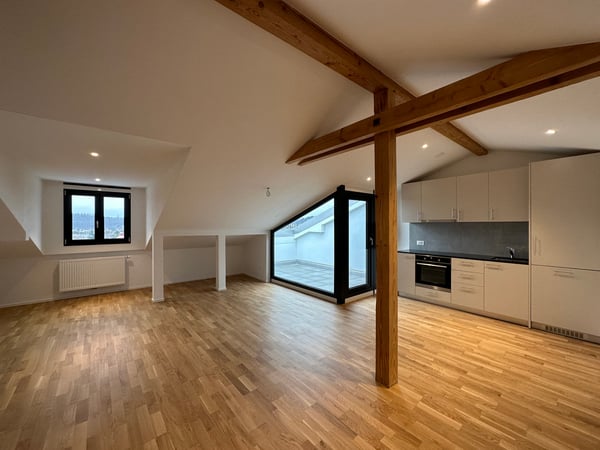 Moderne 2.5-Zimmerdachwohnung im 3. Stock mit Balkon 1