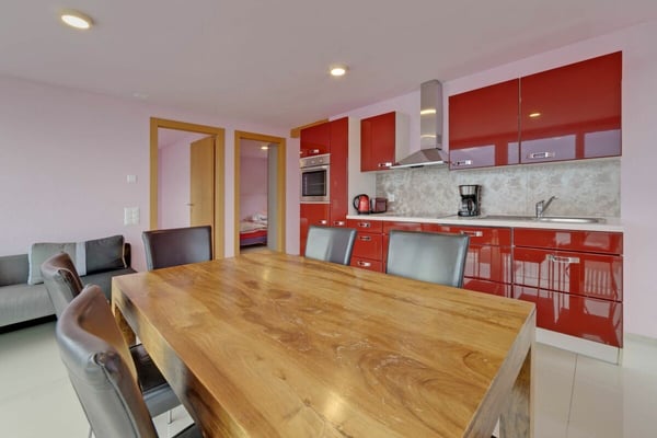 Mehrfamilienhaus (8 Wohneinheiten) mit Panoramablick in Brissago 5