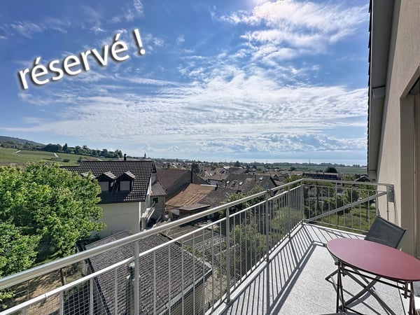 En exclusivité - Appartement lumineux en attique avec vue lac 1