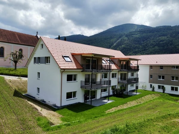 Vollvermietetes Neubau-Mehrfamilienhaus mit 6 x 4.5-Zimmer Wohnungen 1