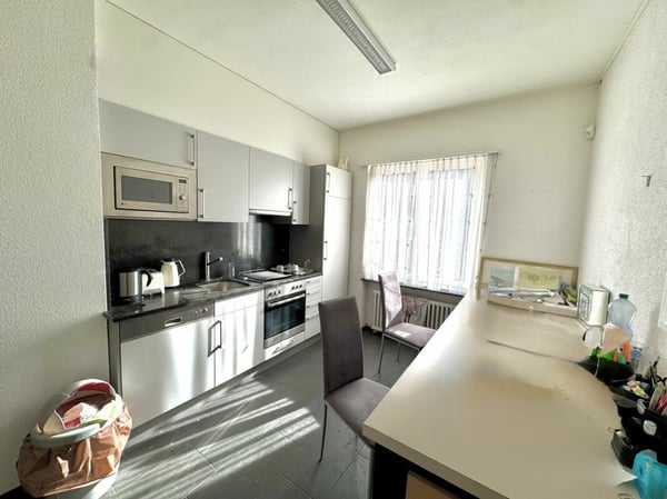 Attraktives Wohn- und Geschäftshaus an zentraler Lage in Augst 6