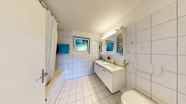 Exklusive 7.5-Zimmer-Wohnung in Greppen - Wohnen mit See- und Bergblick 11