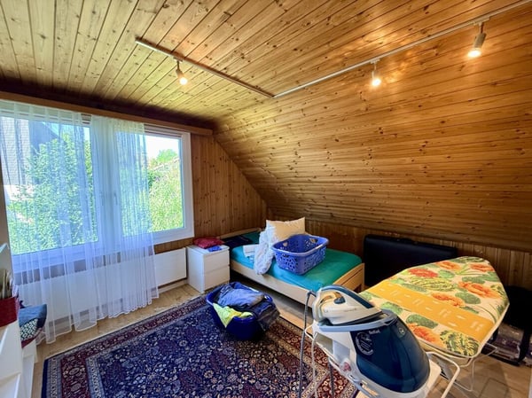 Freistehendes Einfamilienhaus mit Erdsondenheizung, Gaggenau-Küche und Gartenparadies 11