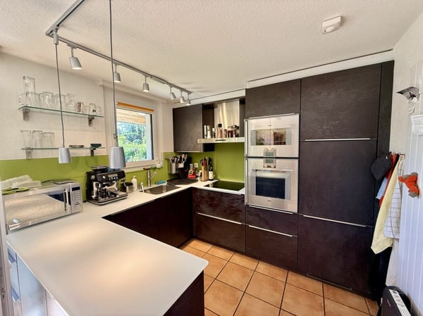 Freistehendes Einfamilienhaus mit Erdsondenheizung, Gaggenau-Küche und Gartenparadies 6
