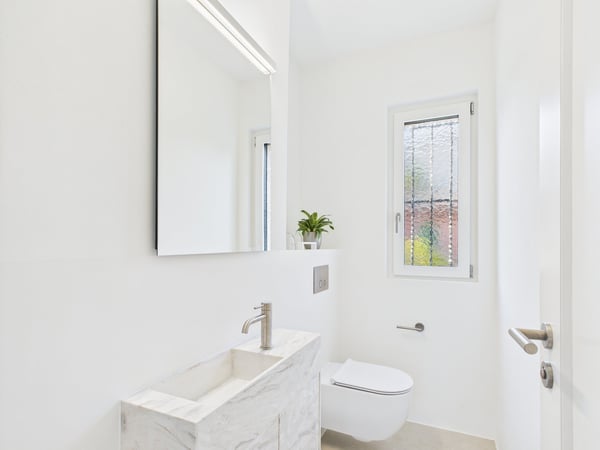 Elegante Erdgeschosswohnung mit Gartenparadies in Ascona – Neubauqualität und luxuriöse Ausstattung 6