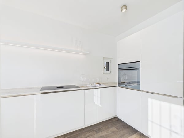 Elegante Erdgeschosswohnung mit Gartenparadies in Ascona – Neubauqualität und luxuriöse Ausstattung 4