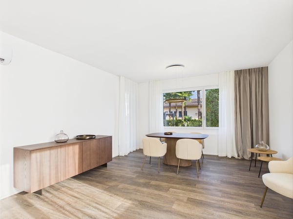 Elegante Erdgeschosswohnung mit Gartenparadies in Ascona – Neubauqualität und luxuriöse Ausstattung 5