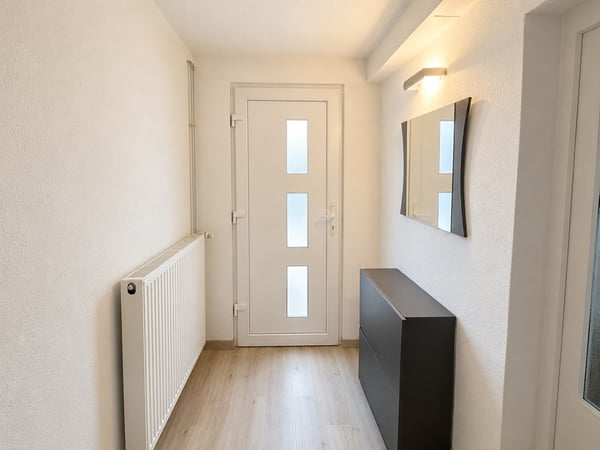 Maison bifamiliale charmante à Grandfontaine – 4.5 pièces avec garage et balcon 16