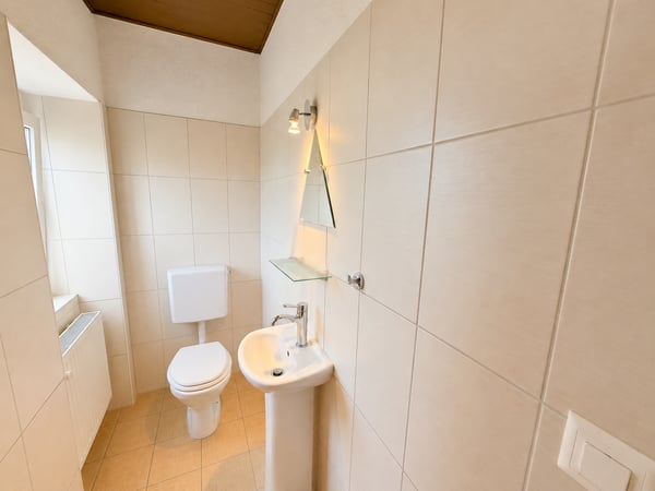 Maison bifamiliale charmante à Grandfontaine – 4.5 pièces avec garage et balcon 13