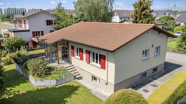 Einfamilienhaus mit Ausbaupotenzial auf grosszügiger Parzelle 1