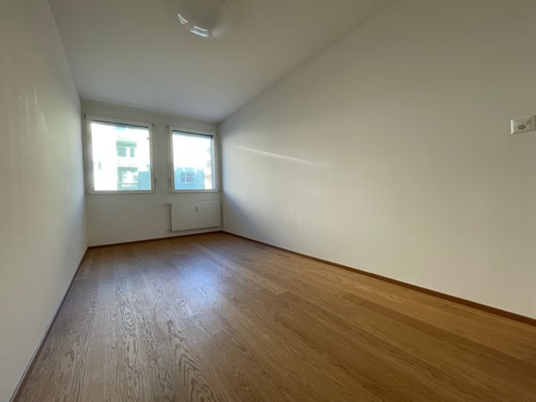 Moderne 3,5-Zimmer-Eigentumswohnung mit gedecktem Balkon und eigener Garagenbox – mitten im Gundeli 7