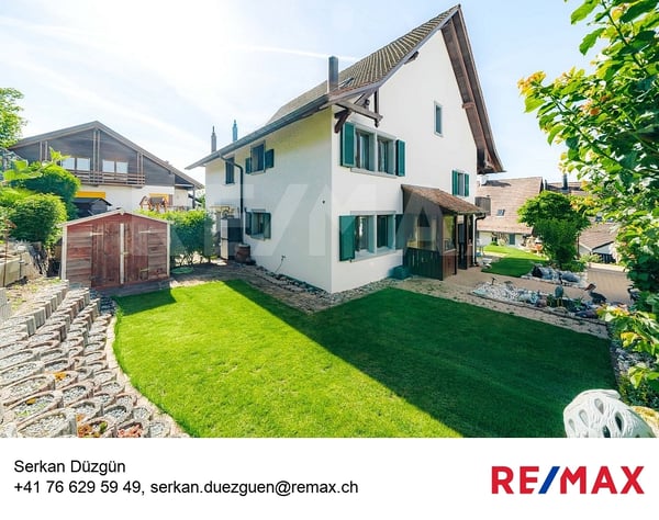 Familienfreundliches Doppeleinfamilienhaus mit Garten an ruhiger Zentrumslage 1