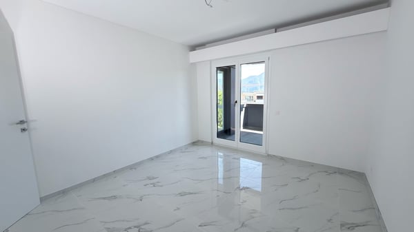 Lugano-Breganzona: elegante 3.5 locali di 105 m², ristrutturato a nuovo con terrazzo 11