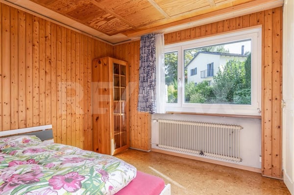 Einfamilienhaus mit Potenzial an begehrter Wohnlage 12