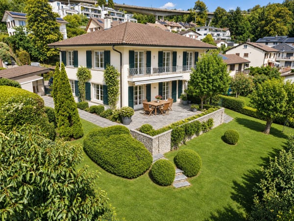 Villa individuelle de 9.5 pièces avec vue sur le Léman et les Alpes 1