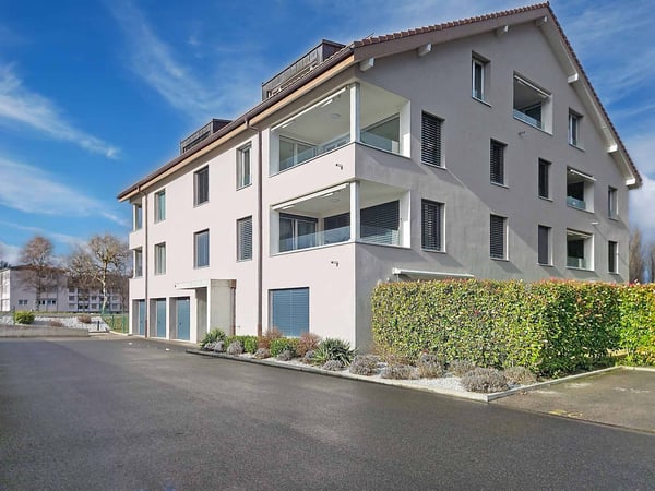 Appartement moderne de 3.5 pièces avec places de parc 1