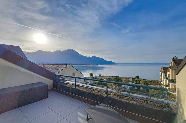 Grand duplex de 3.5 pièces avec vue imprenable sur le lac et les montagnes 9