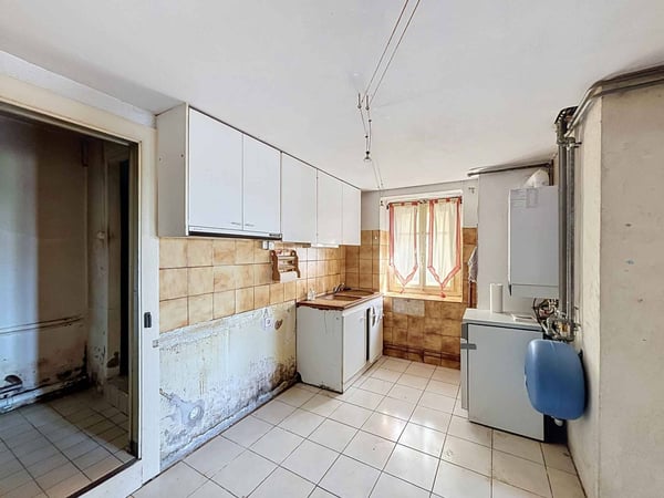 Ferme villageoise de caractère à réinventer au cur d'Areuse 3