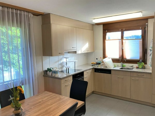 Gepflegte 2.5-Zi.-Erdgeschosswohnung mit gedecktem Sitzplatz 1