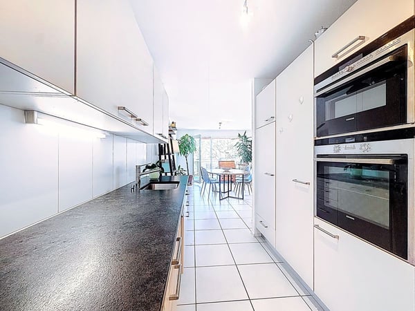 Duplex lumineux de 4,5 pièces, avec balcon plein sud et vue dégagée - belle opportunité à Belfaux 3