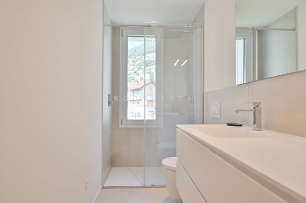 Esclusiva oasi di tranquillità con vista a pochi minuti dal centro 12