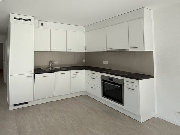 Très bel appartement neuf de 2.5 pièces au rez-de-chaussée 1