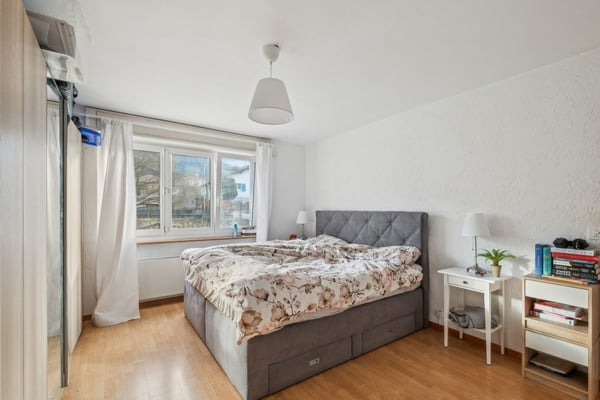 Immeuble avec 2 appartements, 1 salon de coiffure, un terrain à bâtir 6