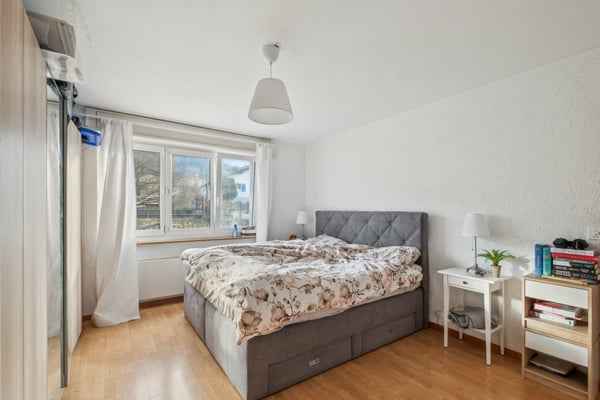 Immeuble avec 2 appartements, 1 salon de coiffure, un terrain à bâtir 6