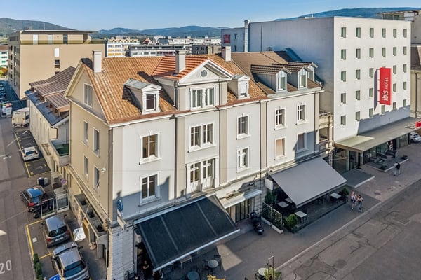 Immeuble de caractère mixte et de rendement au coeur de Delémon 4