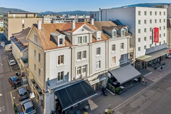 Immeuble de caractère mixte et de rendement au coeur de Delémon 4