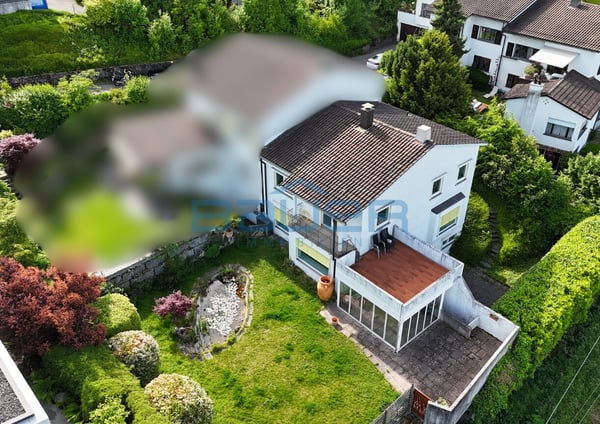 Familienfreundliche Doppelhaushälfte mit Seesicht und Garten 2