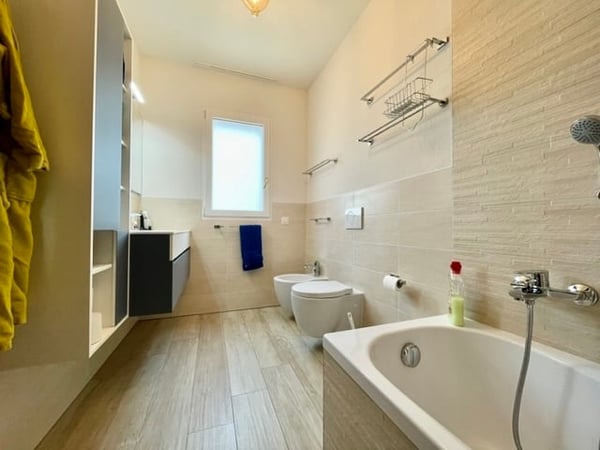Moderno appartamento 3.5 a Lema Curio con giardino privato 5