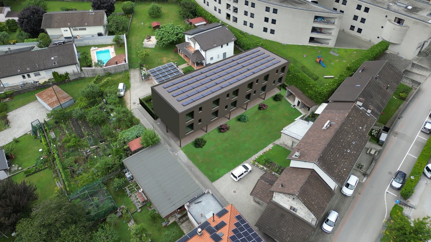 multiple houses, solar panels on roofs, garden, playground, pool
