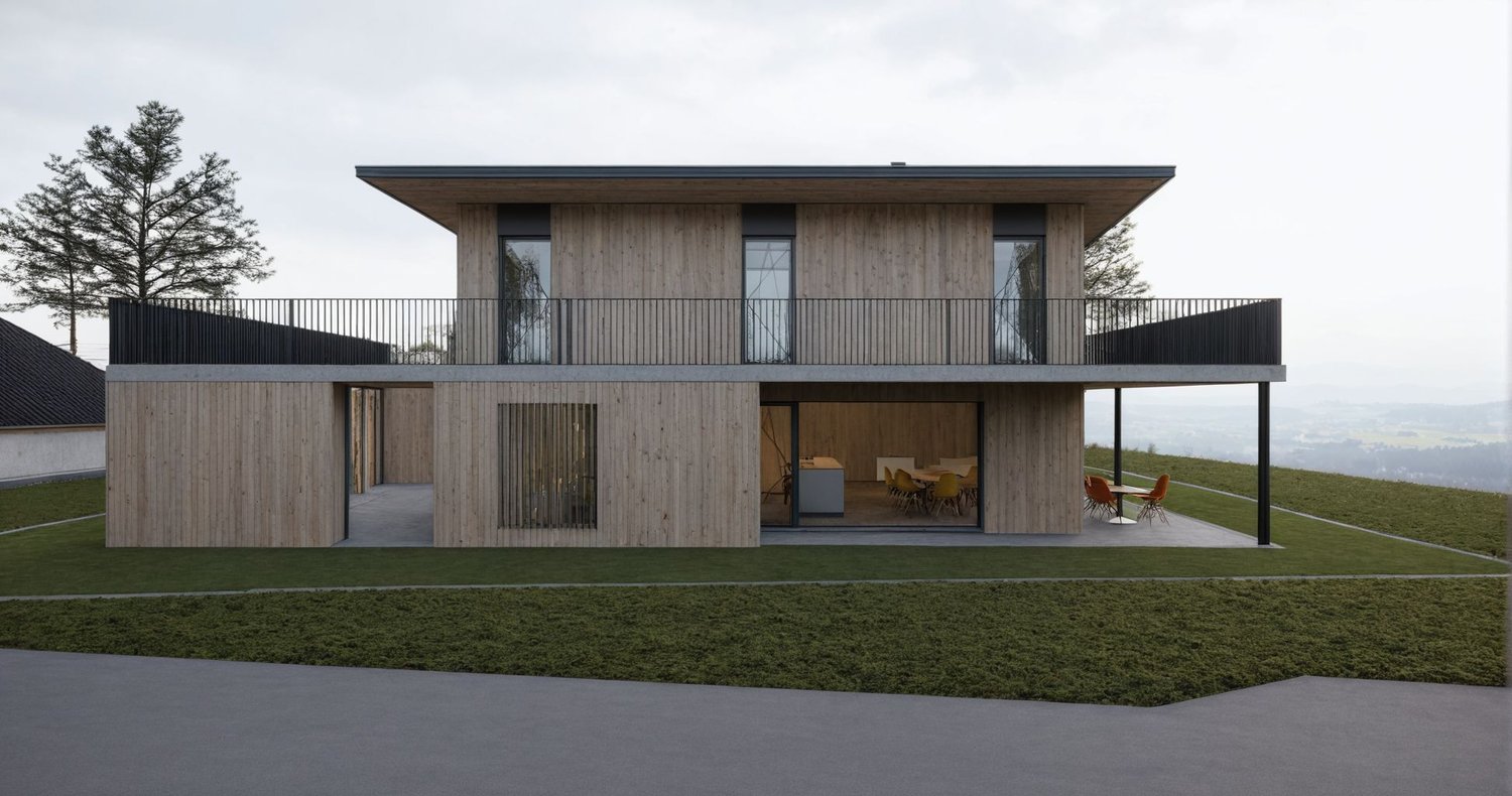 Modern two-story house with wooden exterior, elevated ground floor, large balcony