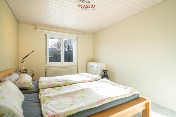 7-Zimmer 2-Familienhaus mit Studio, Gewerbefläche & Alpenblick 13