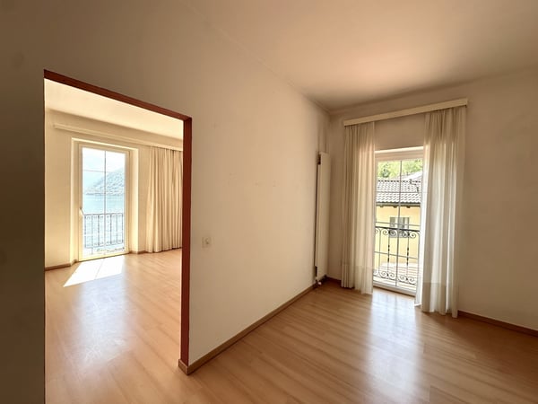 CASA UNIFAMILIARE 4.5 LOCALI CON VISTA MOZZAFIATO SUL LAGO 12