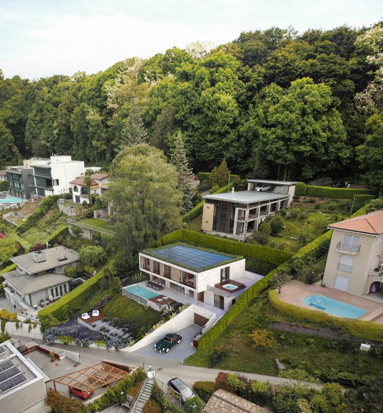 Occasione unica nella Collina dOro  Terreno di 950 mq con progetto approvato e vista lago 1