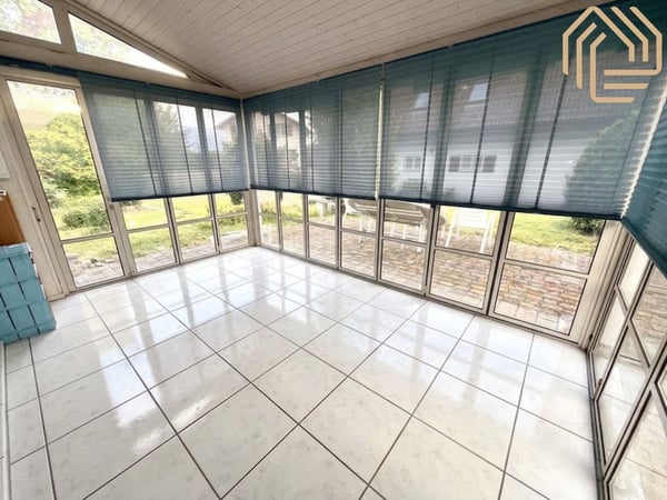 Exklusive 5.5 Zimmerwohnung – inkl. Garage & Wintergarten 4