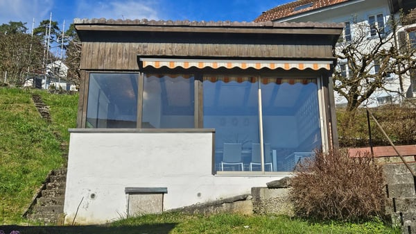 Einfamilienhaus mit 2 Wohnungen und wunderbarer Weitsicht in die Berge 8