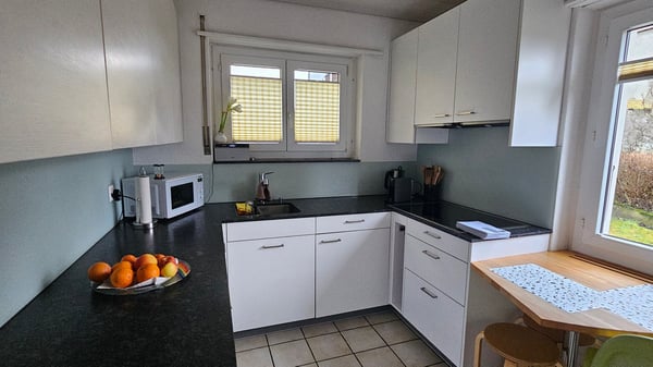Einfamilienhaus mit 2 Wohnungen und wunderbarer Weitsicht in die Berge 13
