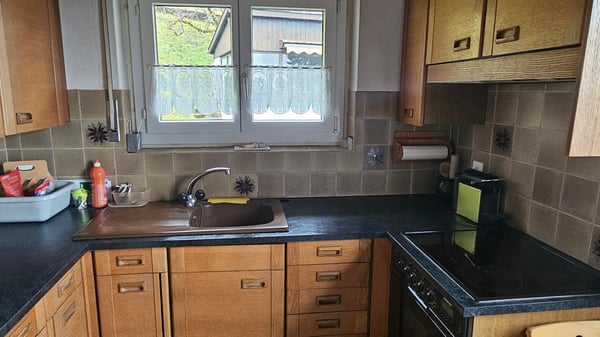 Einfamilienhaus mit 2 Wohnungen und wunderbarer Weitsicht in die Berge 11