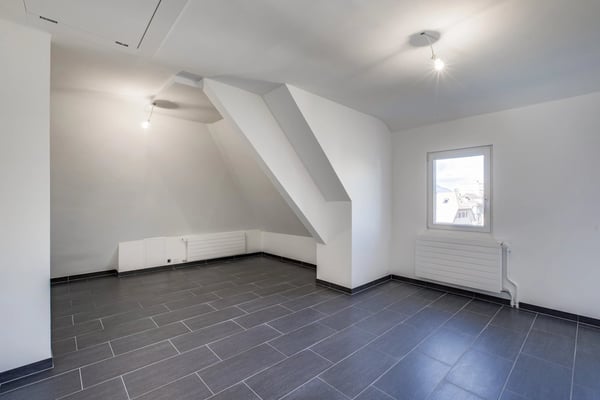 Immeuble de rendement entièrement loué 11