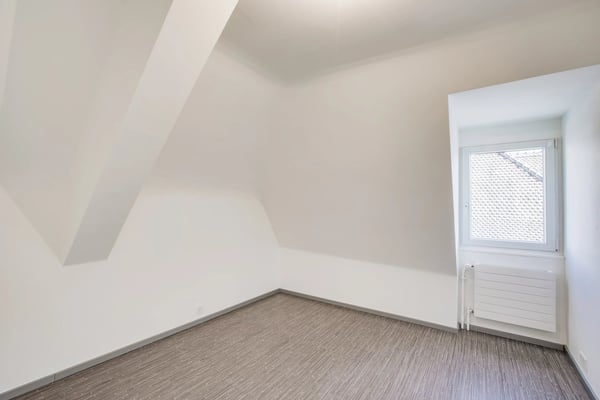 Immeuble de rendement entièrement loué 13