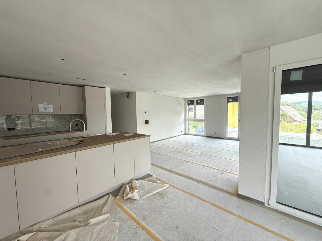 Erstbezug: Gartenmaisonettewohnung mit Einliegerwohnung