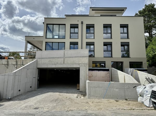 Erstbezug: Gartenmaisonettewohnung mit Einliegerwohnung 1