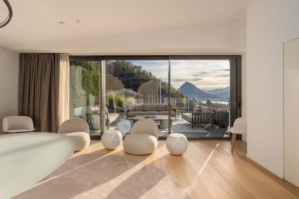 EXKLUSIVE VILLA MIT PANORAMABLICK AUF DEN LUGANOSEE 12