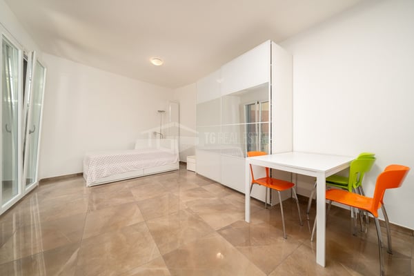 MODERNO MONOLOCALE AMMOBILIATO CON GIARDINO 9