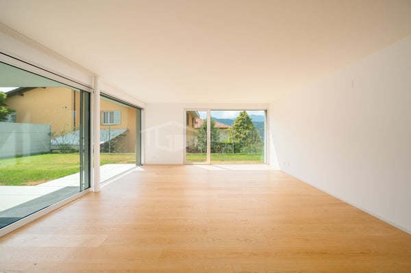 MODERNA CASA DI 5.5 LOCALI CON GIARDINO 4