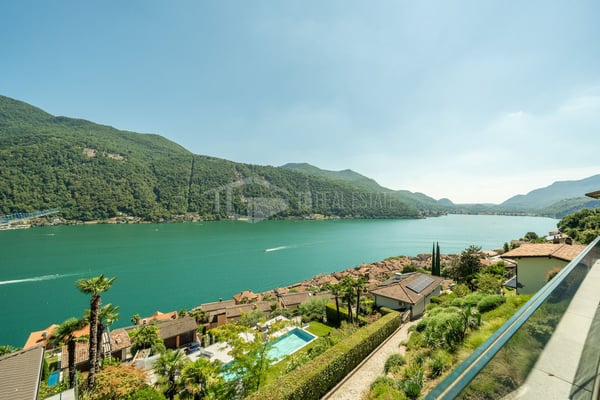 ELEGANTE APPARTAMENTO DI 4 LOCALI CON GIARDINO E VISTA LAGO 17